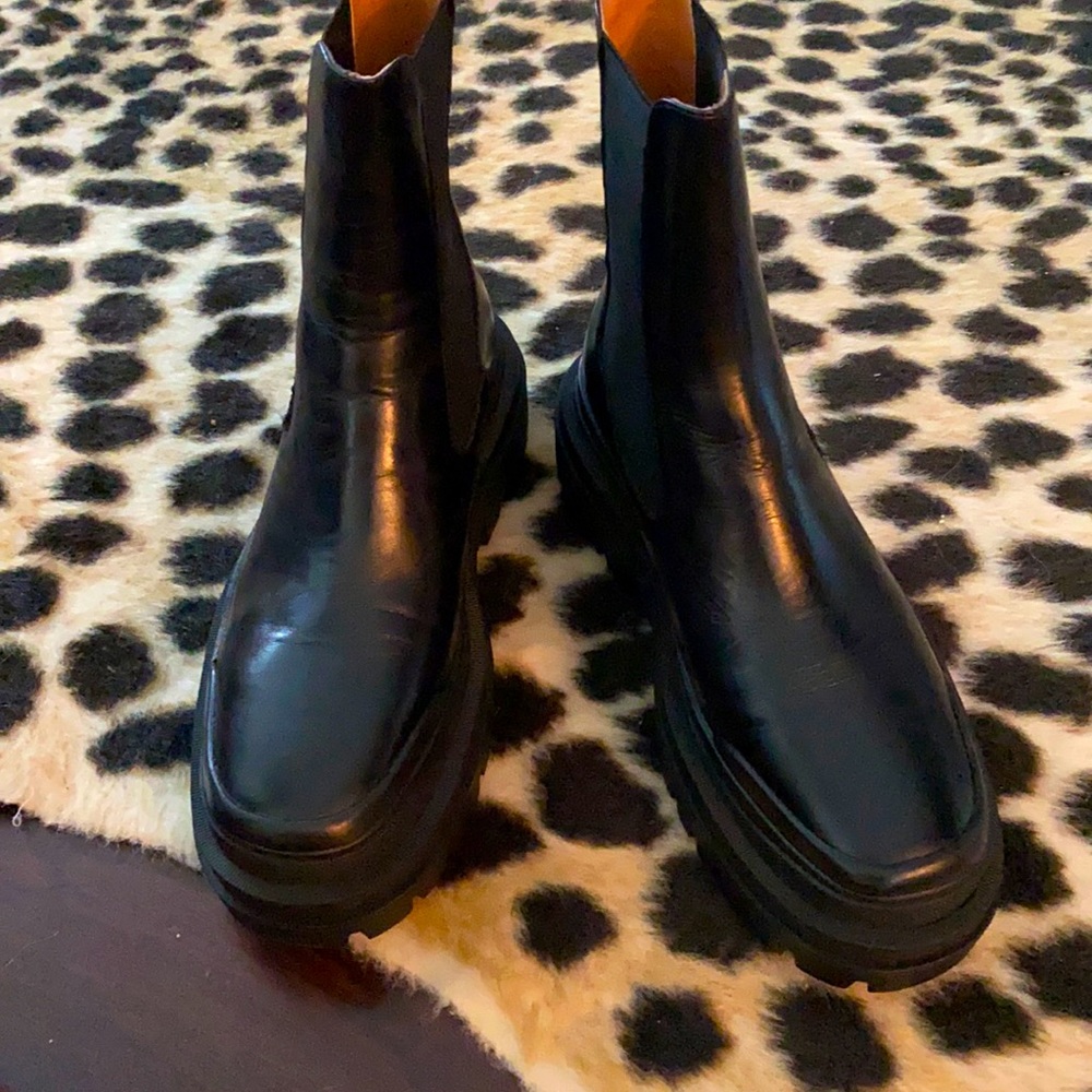 Black leather lug boots